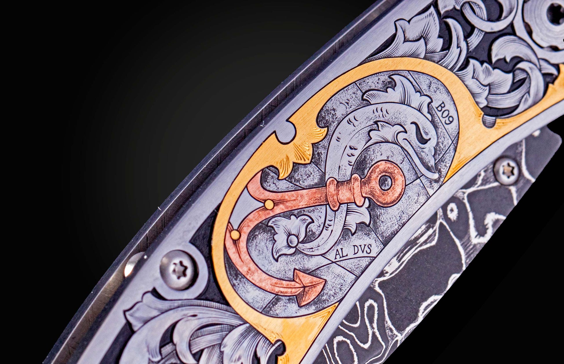 Hand engraved William Henry knife with damascus steel blade
