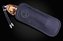 Hand engraved knife with Alaskan game animals, wooly mammoth tusk and damascus steel