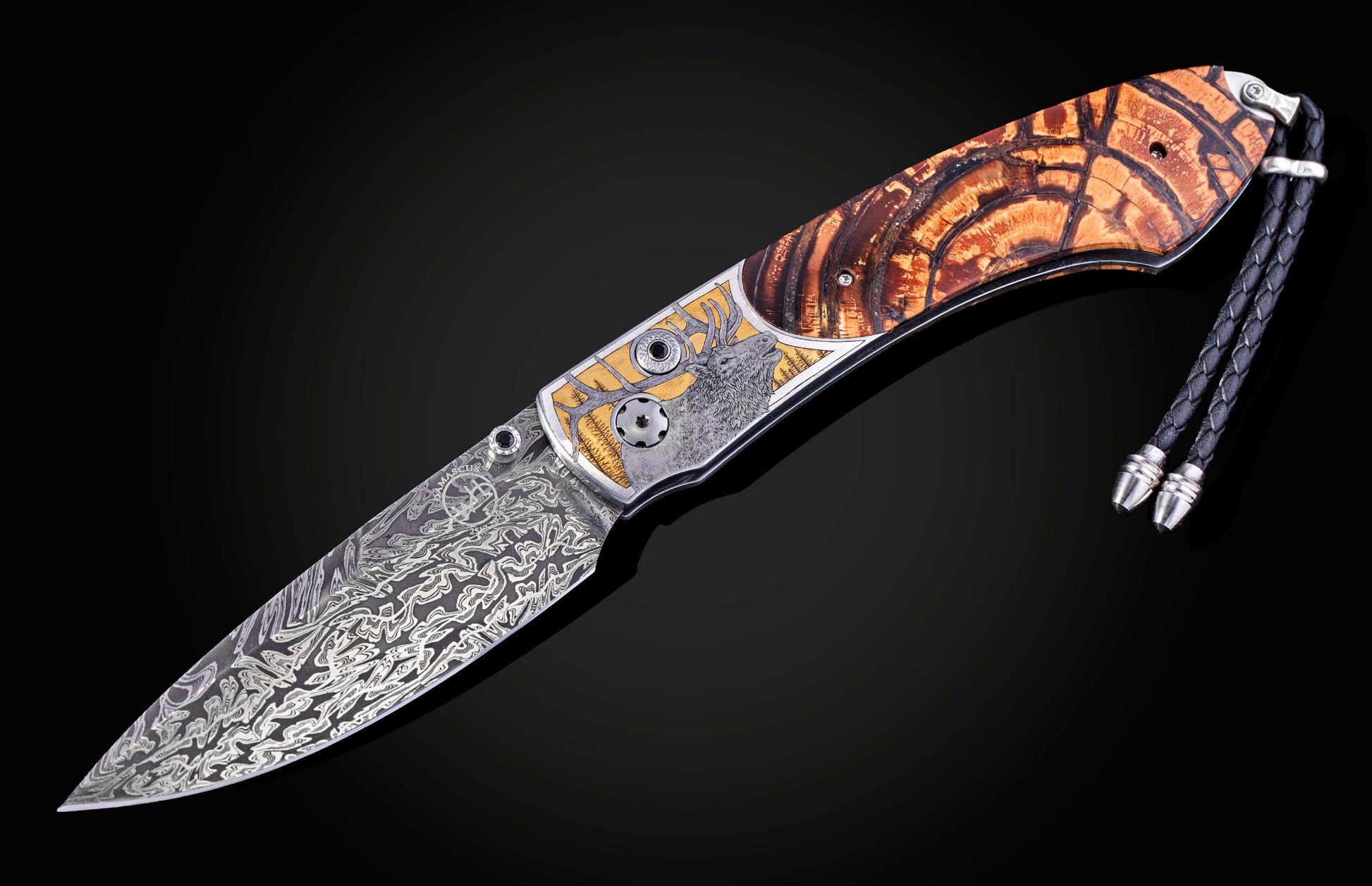 Hand engraved William Henry knife depicting an Elk with fossil woolly mammoth tusk and damascus steel