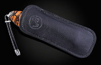 Hand engraved William Henry knife depicting an Elk with fossil woolly mammoth tusk and damascus steel