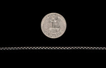 Black Box Chain men's jewelry from William Henry is bronze with black PVD coating for easy care and durability. Image shows the Black Box Chain next to a Quarter as a size reference. 