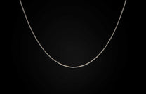 Sterling silver Box Chain necklace men's jewelry from William Henry. Chain is displayed on a black background.