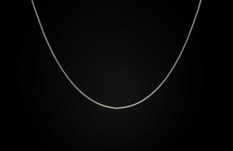 Sterling silver Box Chain necklace men's jewelry from William Henry. Chain is displayed on a black background.