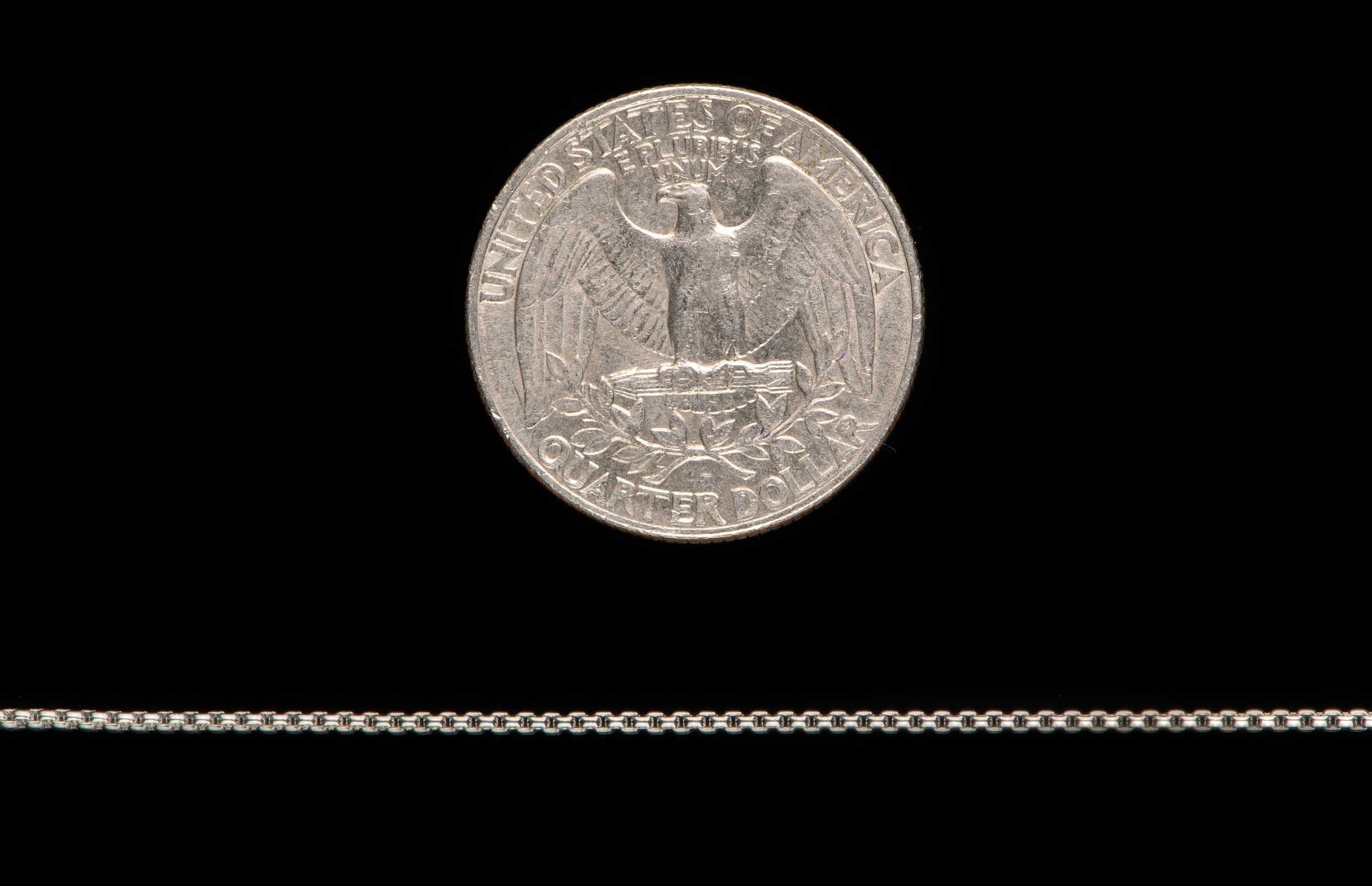 Sterling silver Box Chain necklace men's jewelry from William Henry. Chain is displayed next to a quarter as a size reference.