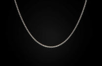 Sterling silver Box Chain necklace men's jewelry from William Henry. Chain is displayed on a black background.