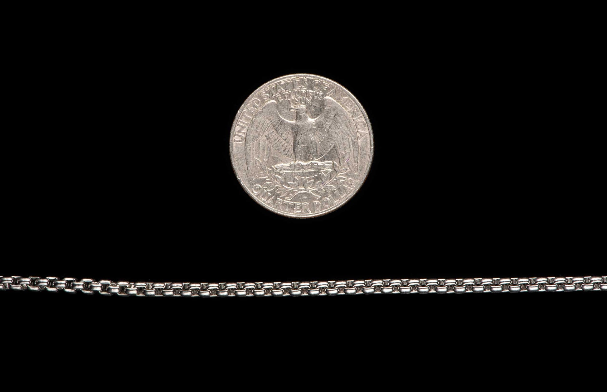 Sterling silver Box Chain necklace men's jewelry from William Henry. Chain is displayed next to a US quarter for size reference.