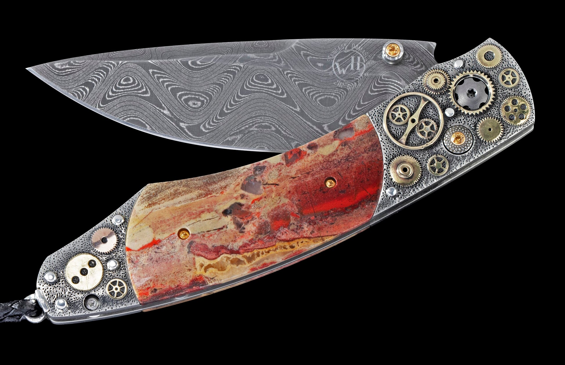 Open folding knife with a wavy Damascus steel blade and a red petrified wood handle adorned with metal gears and yellow gems.
