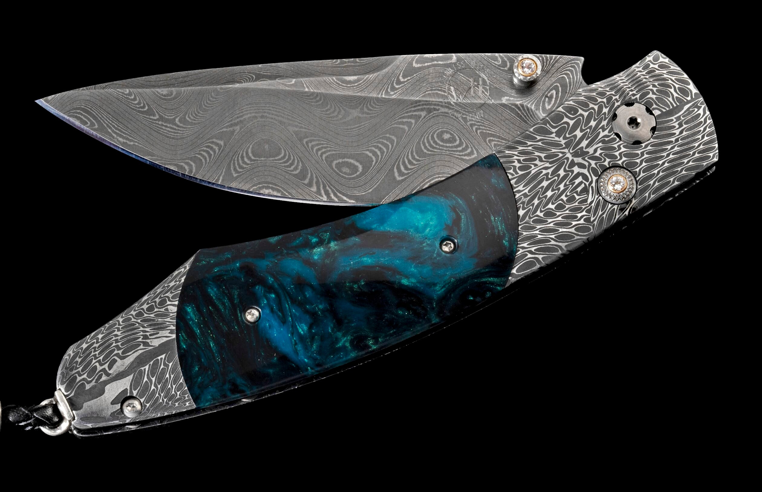 Damascus folding knife with a teal resin handle, intricate Damascus patterns, and gemstone-adorned hardware, partially open.