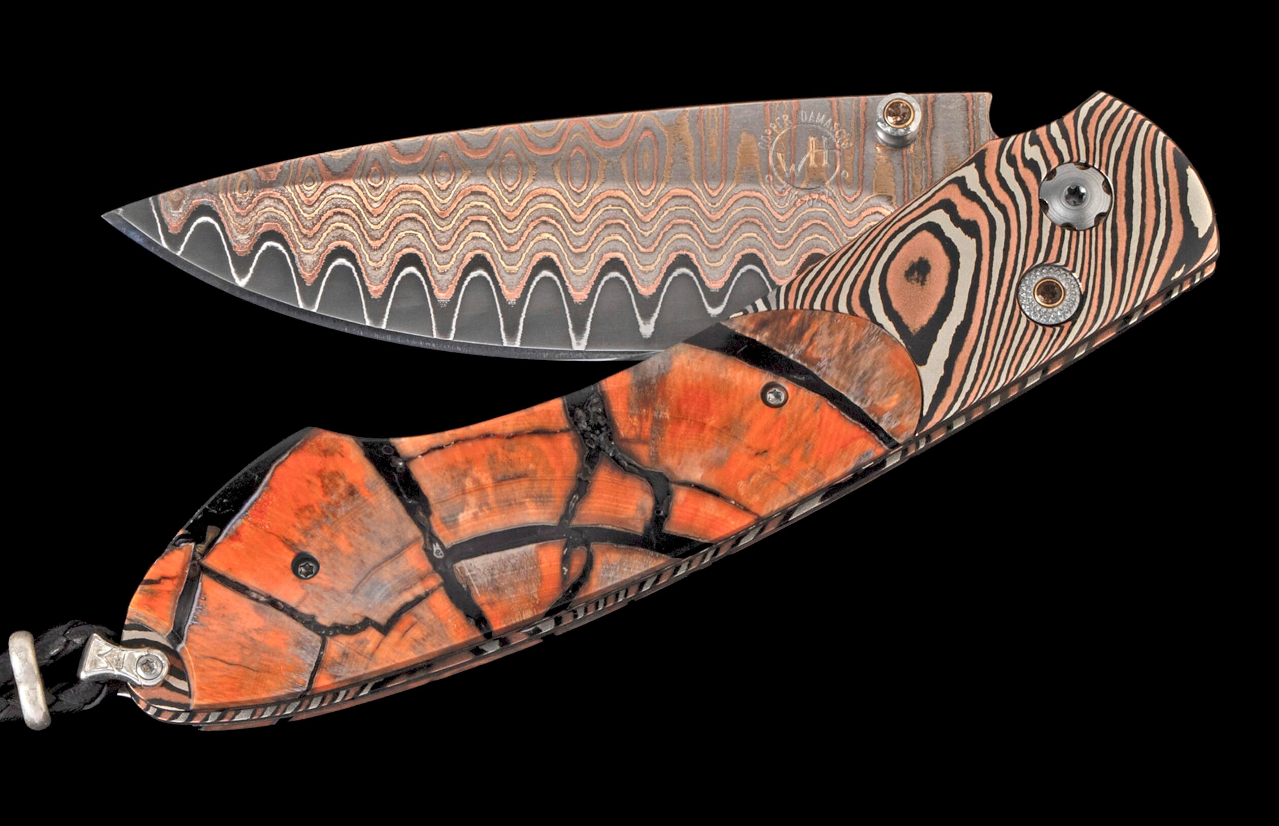 Open folding knife with a wavy copper damascus blade, a striped bolster, and a cracked orange handle.
