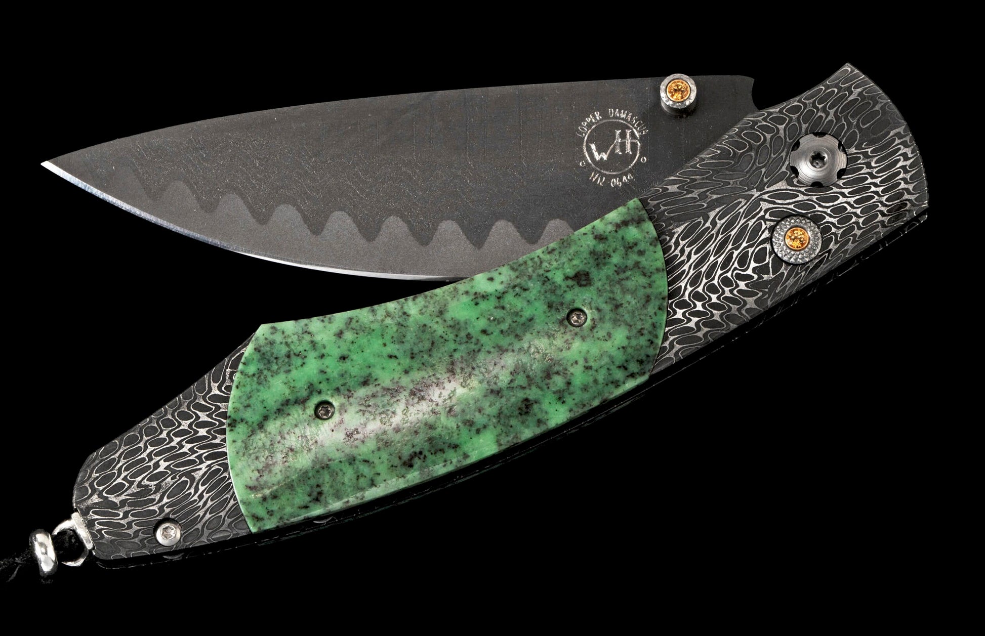 Folding knife with dark gray Copper Damascus blade, WH logo, wavy pattern, green speckled handle scale, and patterned steel frame with orange accents.