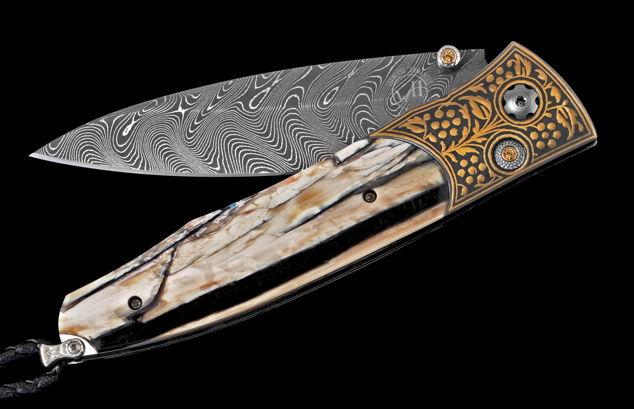 Damascus steel folding knife with a swirling blade, light-toned striated handle, and gold engraved floral pattern on a dark bolster.
