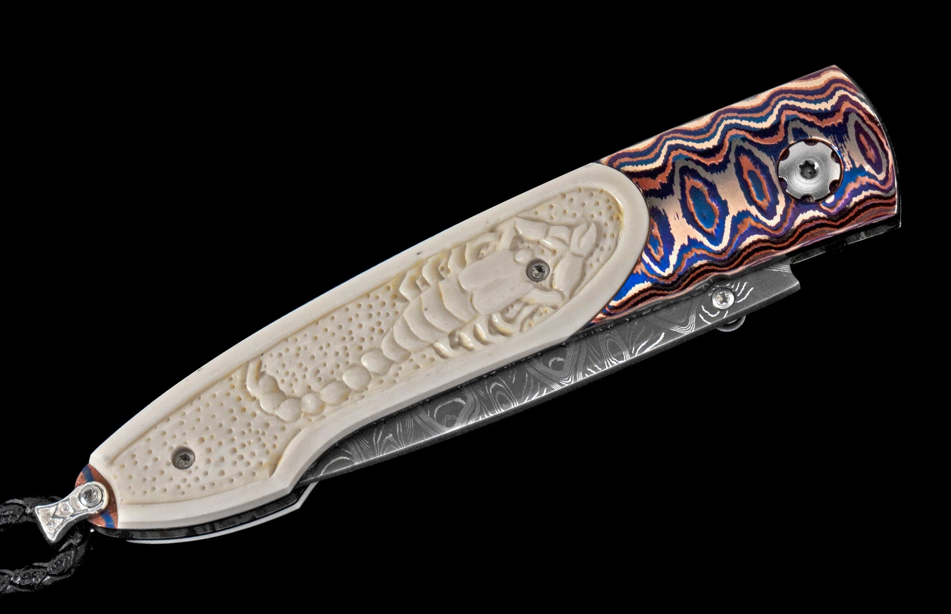 Custom folding knife with a carved cream handle featuring a scorpion motif, vibrant wavy patterned metal scale, and a Damascus blade.