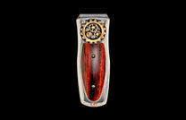 Steampunk money clip featuring silver metal, intricate gold gears, and a rich reddish-brown wood inlay.