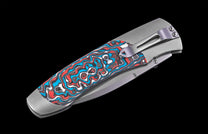 Folding knife with a colorful handle on a black background