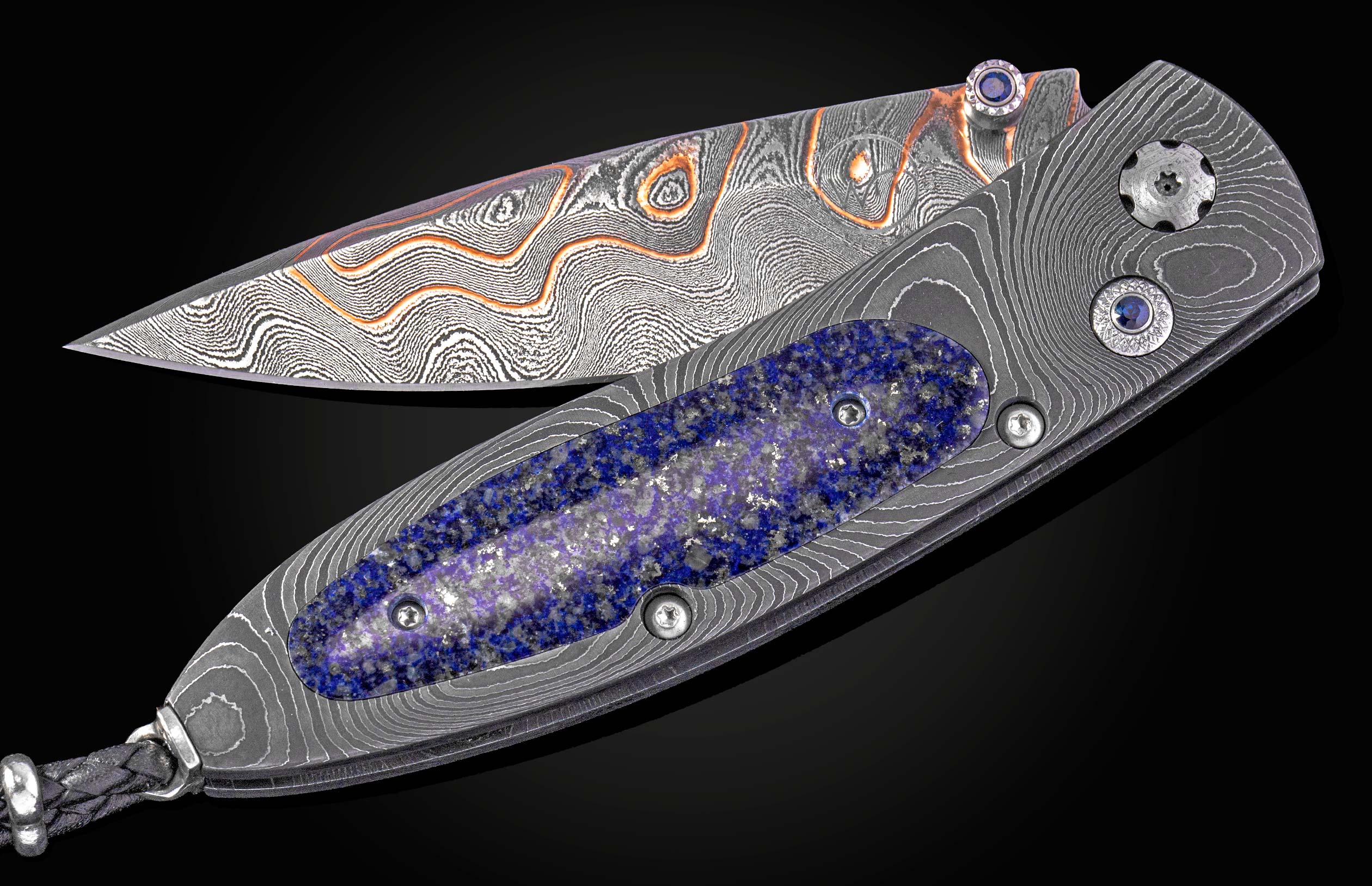 William Henry folding knife with damascus steel and blue lapis lazuli scales. 