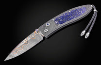William Henry folding knife with damascus steel and blue lapis lazuli scales. 