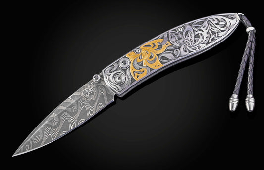 Hand engraved William Henry knife with 24k gold inlays and damascus steel blade
