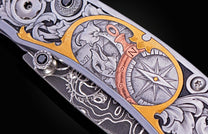 Hand engraved William Henry knife with damascus steel blade