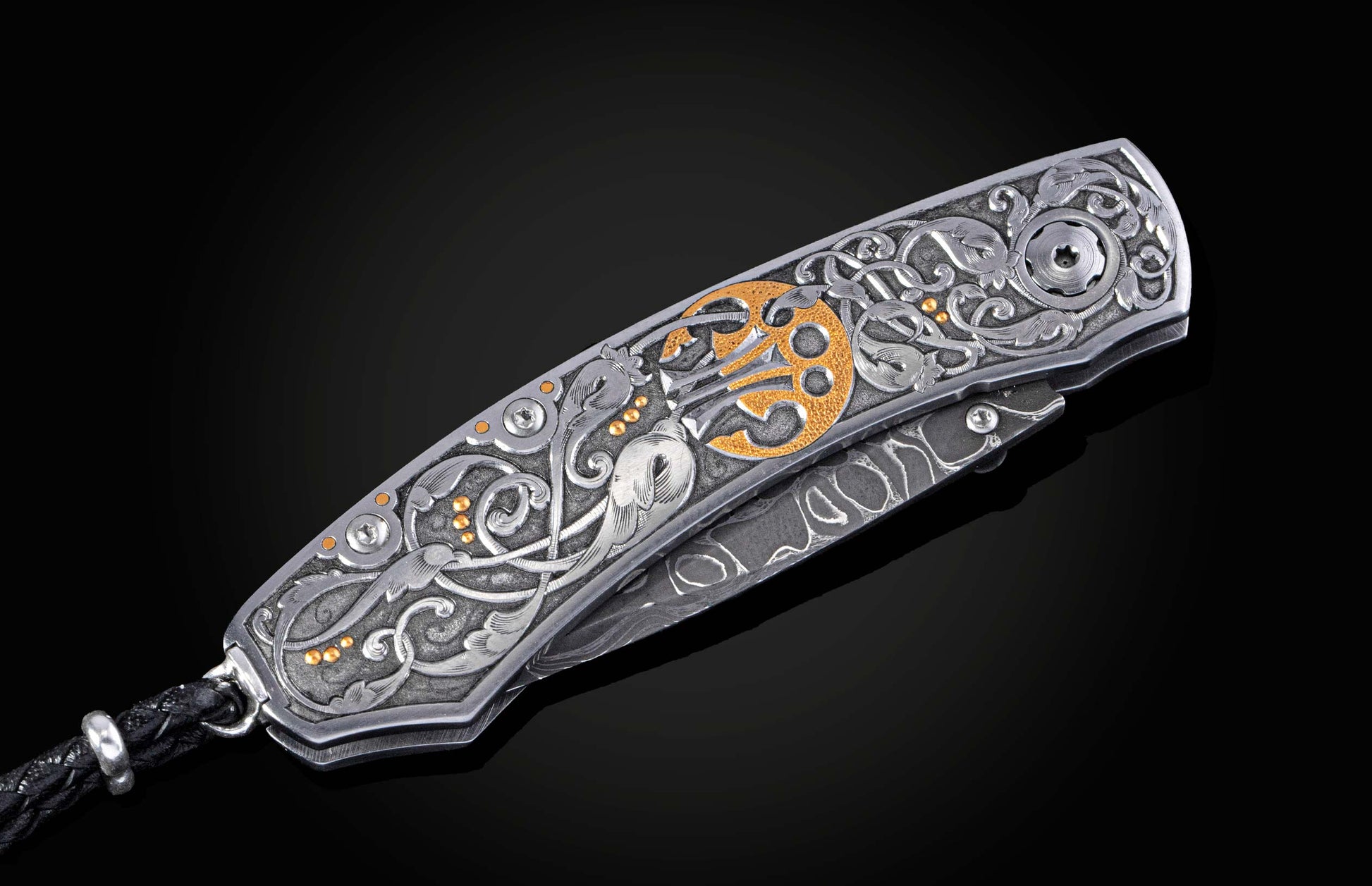 Decorative knife with intricate patterns on a dark background