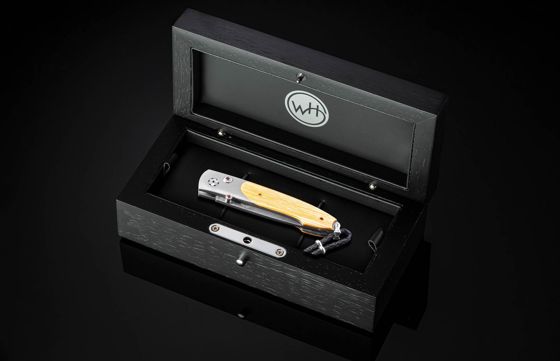 Damascus and titanium folding knife, inlaid with wood from the Gaylord Family Oklahoma Memorial Stadium bleachers