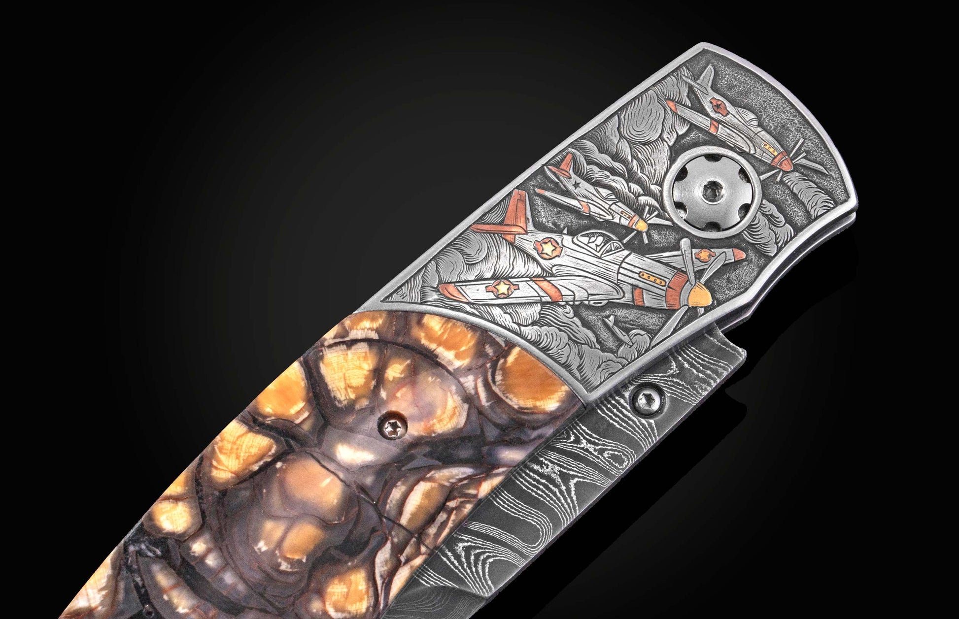 Luxury P51 Mustang knife with engraved fighter planes and amber resin handle, side view on black background