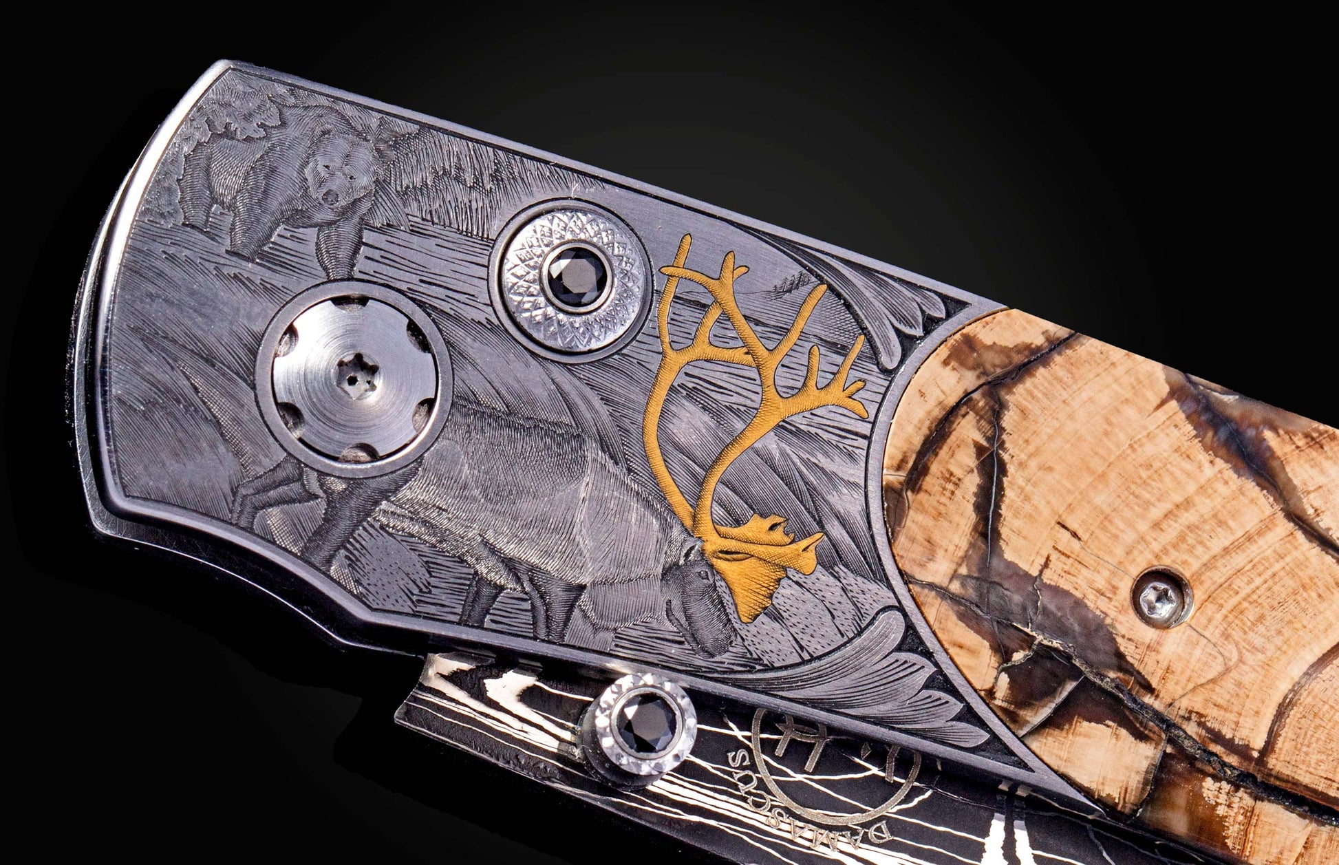 Hand engraved knife with Alaskan game animals, wooly mammoth tusk and damascus steel