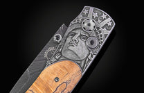 Folding knife with wooden handle and decorative blade on a black background