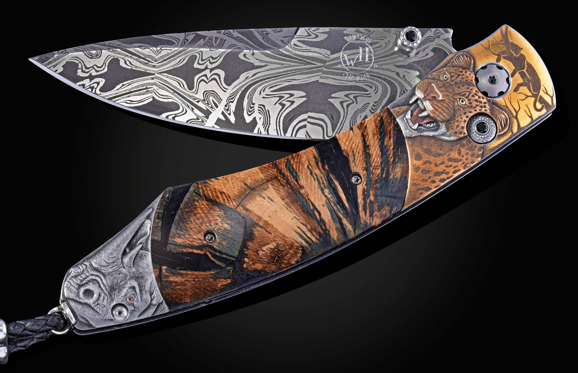 Foldable knife with fossil mammoth tusk, hand engraving, and damascus blade on a black background
