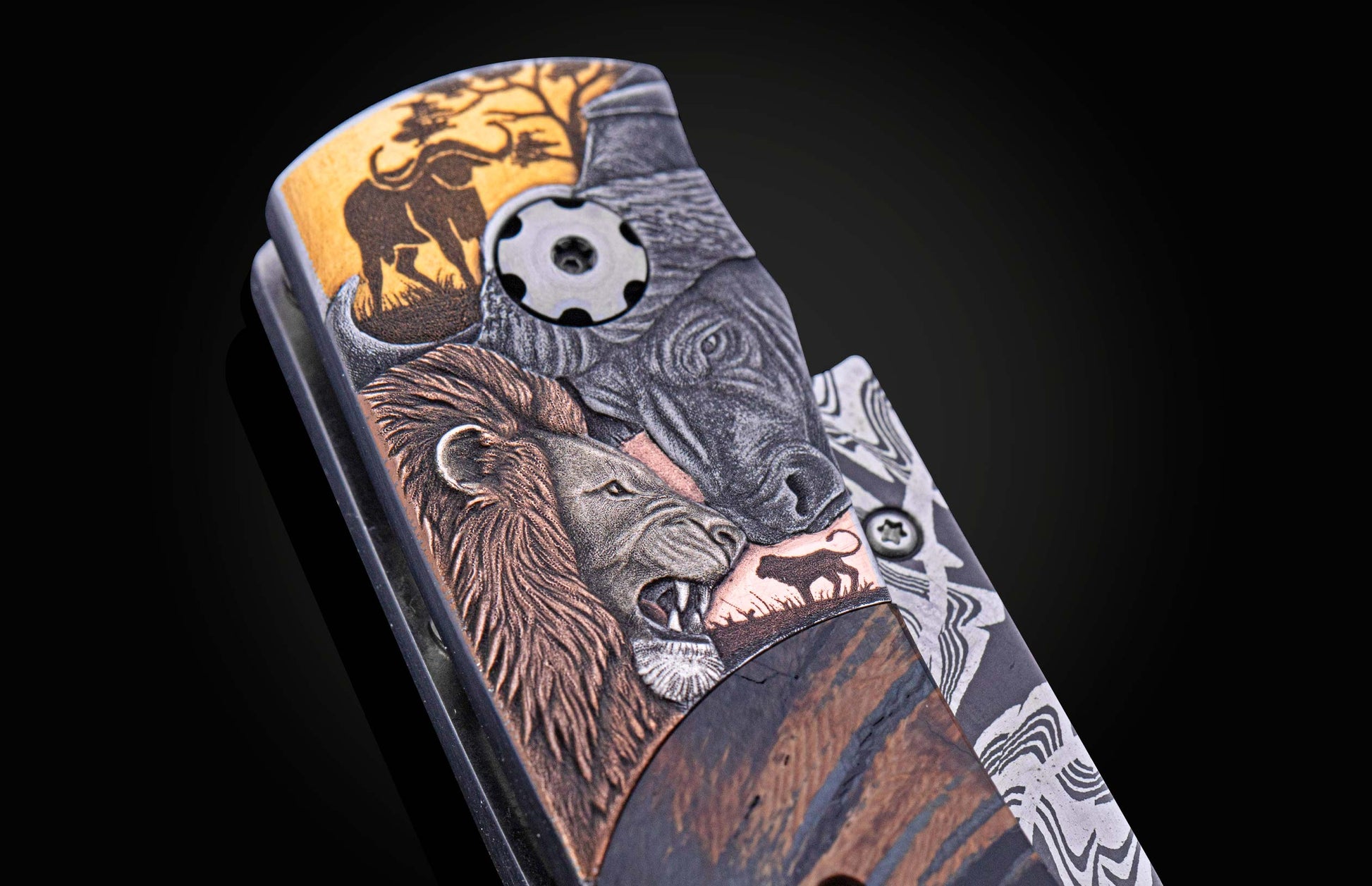 B12 Big 5 knife with an elaborately carved handle depicting a roaring lion, buffalo, tusked animal head, and leopard in multi-toned finishes.