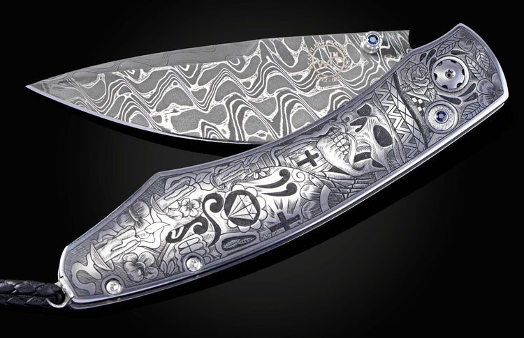 Decorative knife with intricate patterns on a dark background
