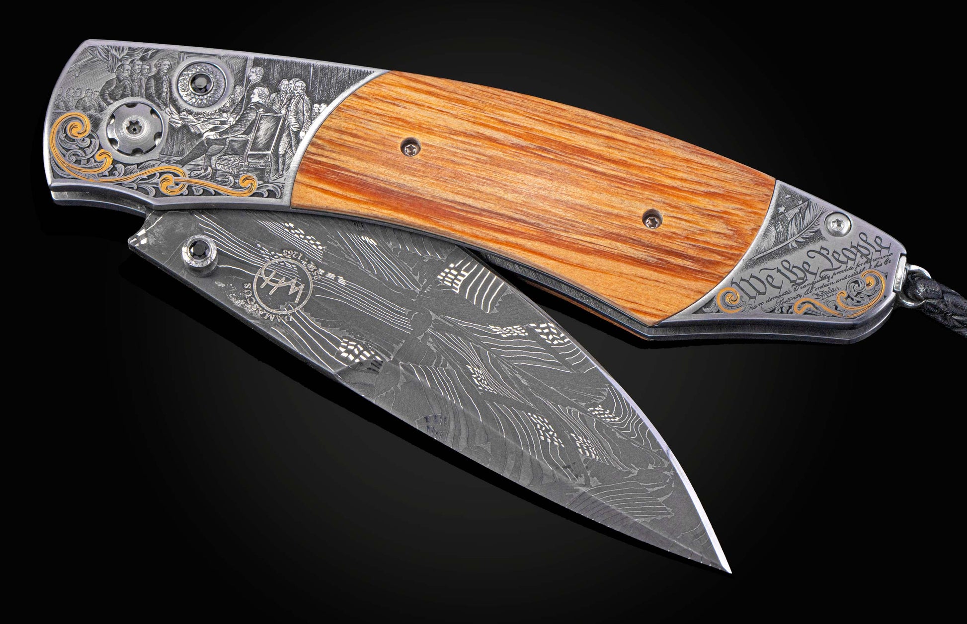 Folding knife with wood handle and intricate hand engraving of historical event. Knife show partially open.
