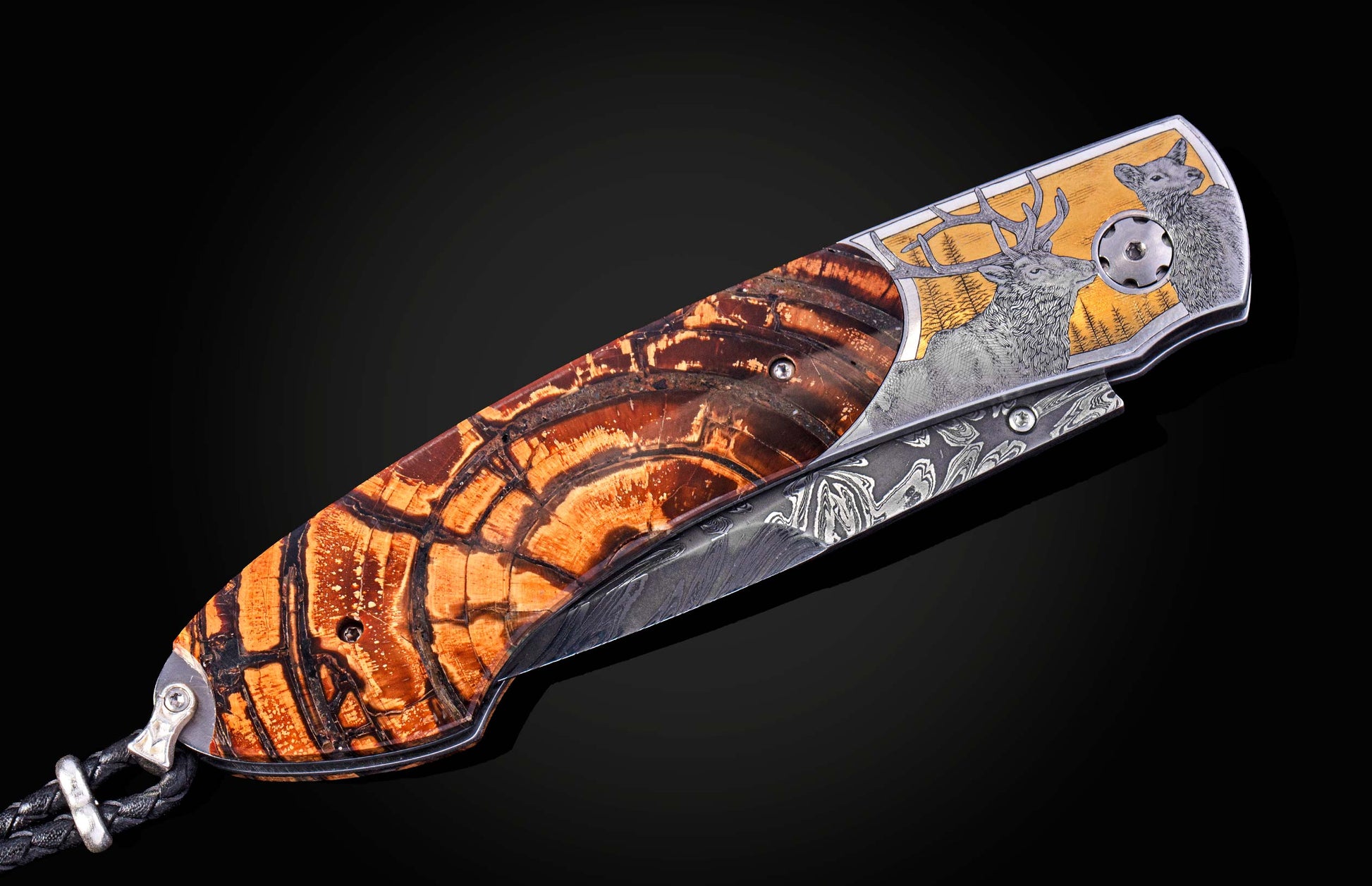 Hand engraved William Henry knife depicting an Elk with fossil woolly mammoth tusk and damascus steel