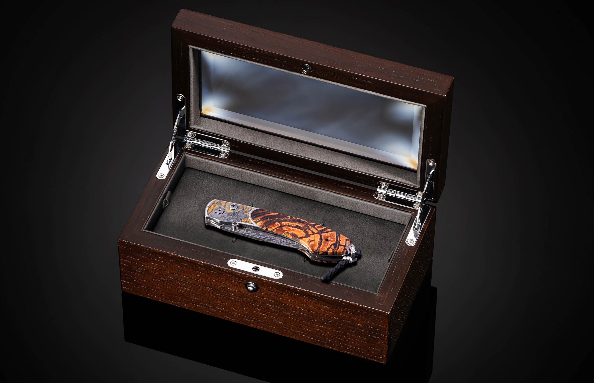 Hand engraved William Henry knife depicting an Elk with fossil woolly mammoth tusk and damascus steel