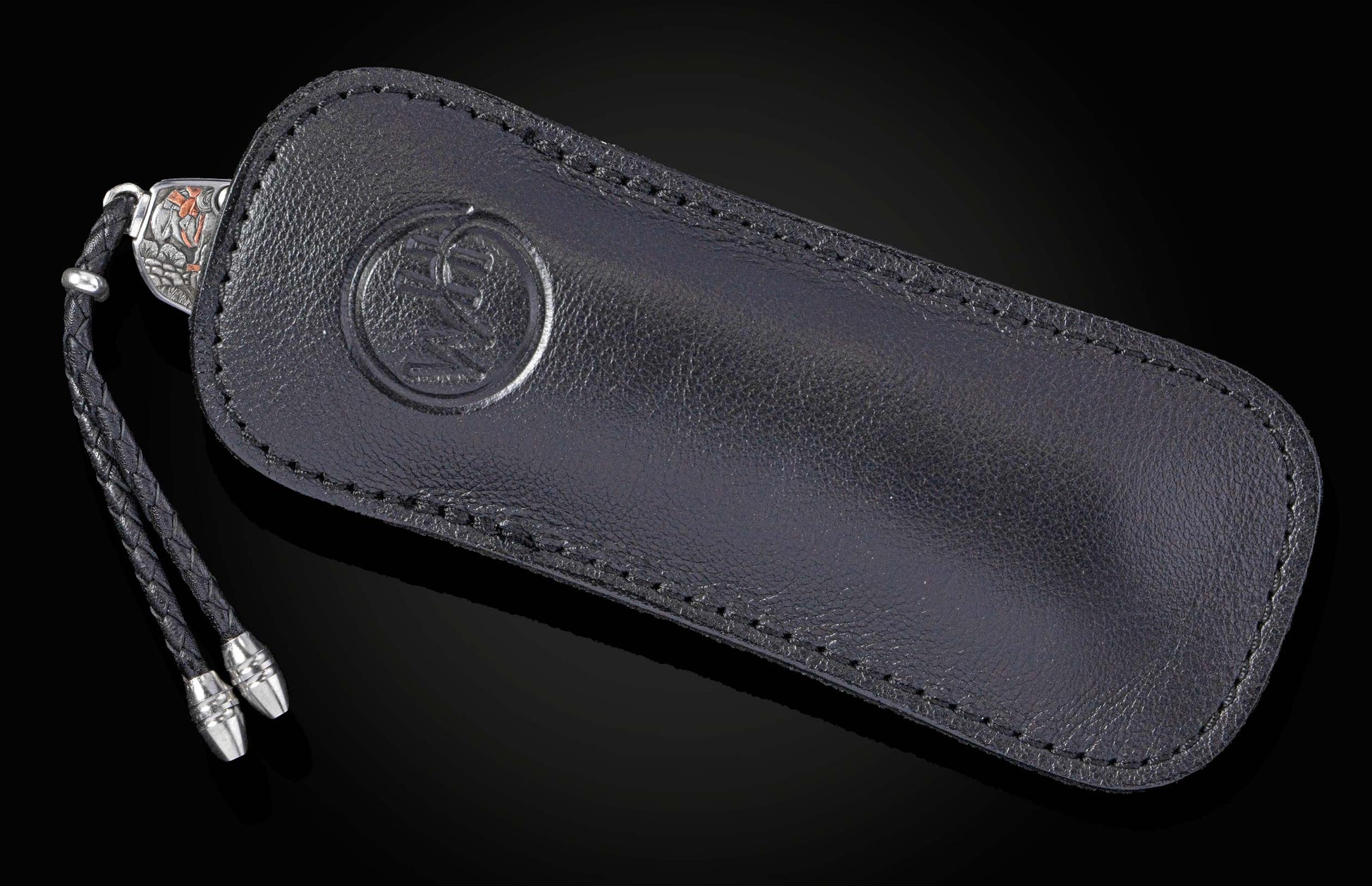 knife in a black leather case