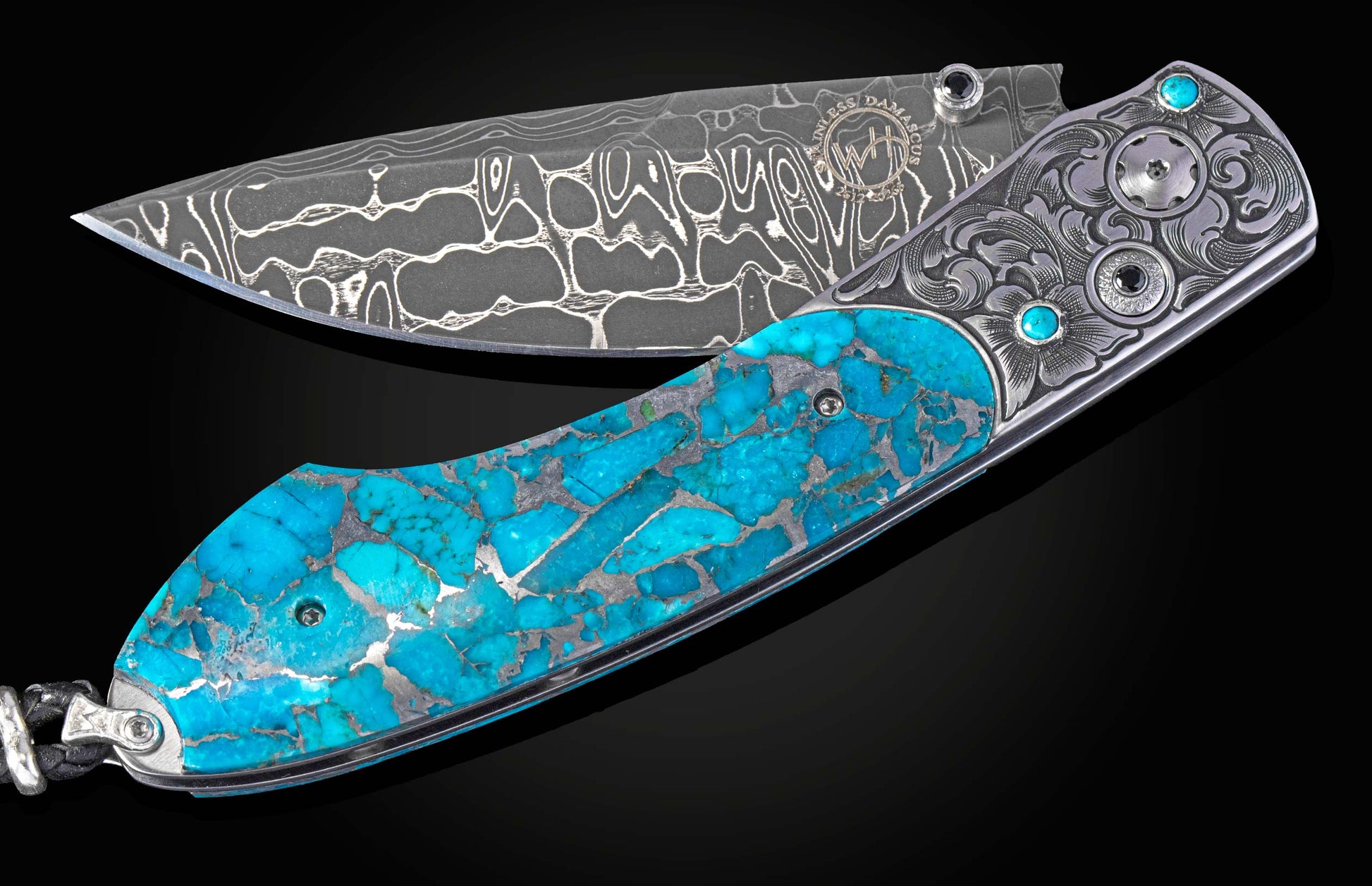 Hand engraved knife with turquoise and damascus blade partially open on a black background