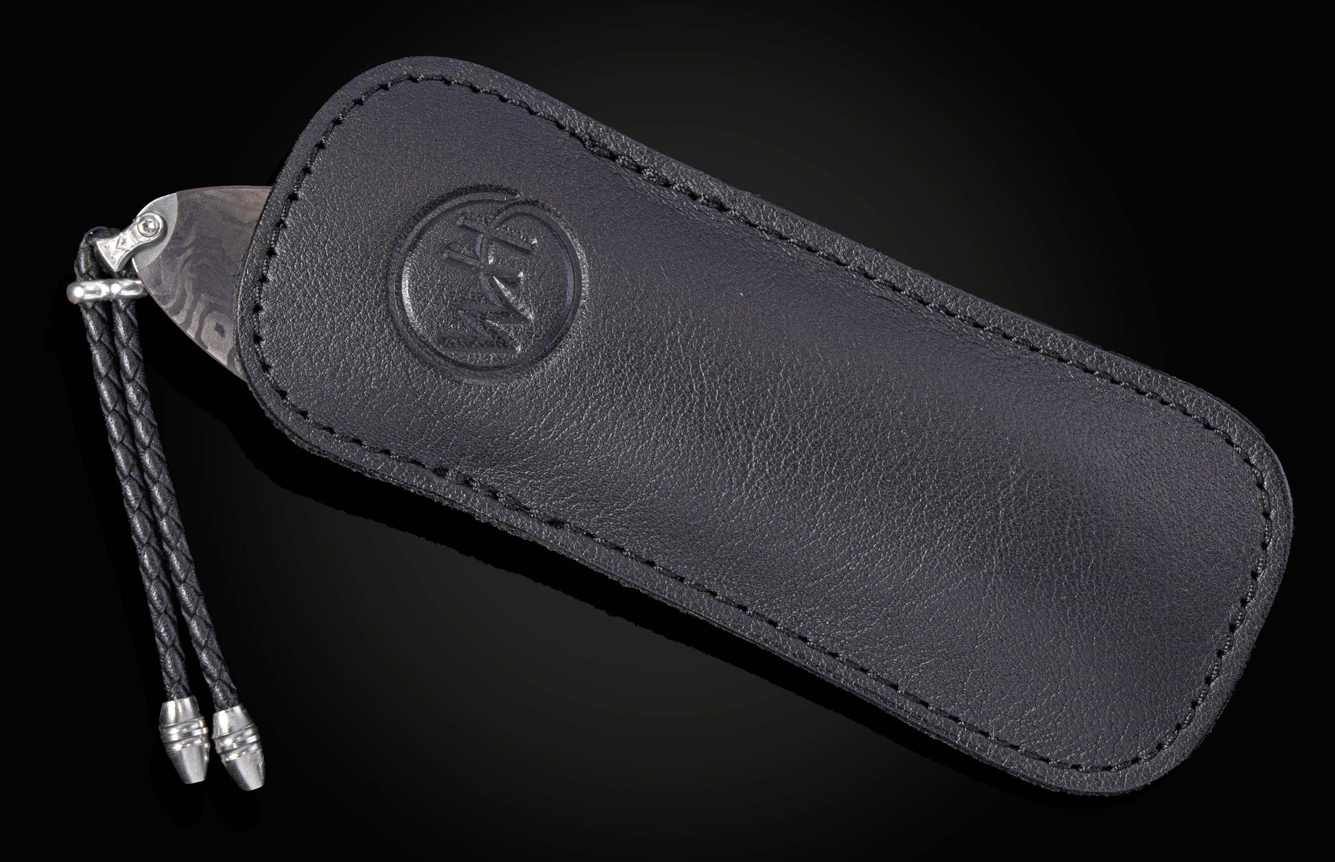 knife in black leather case