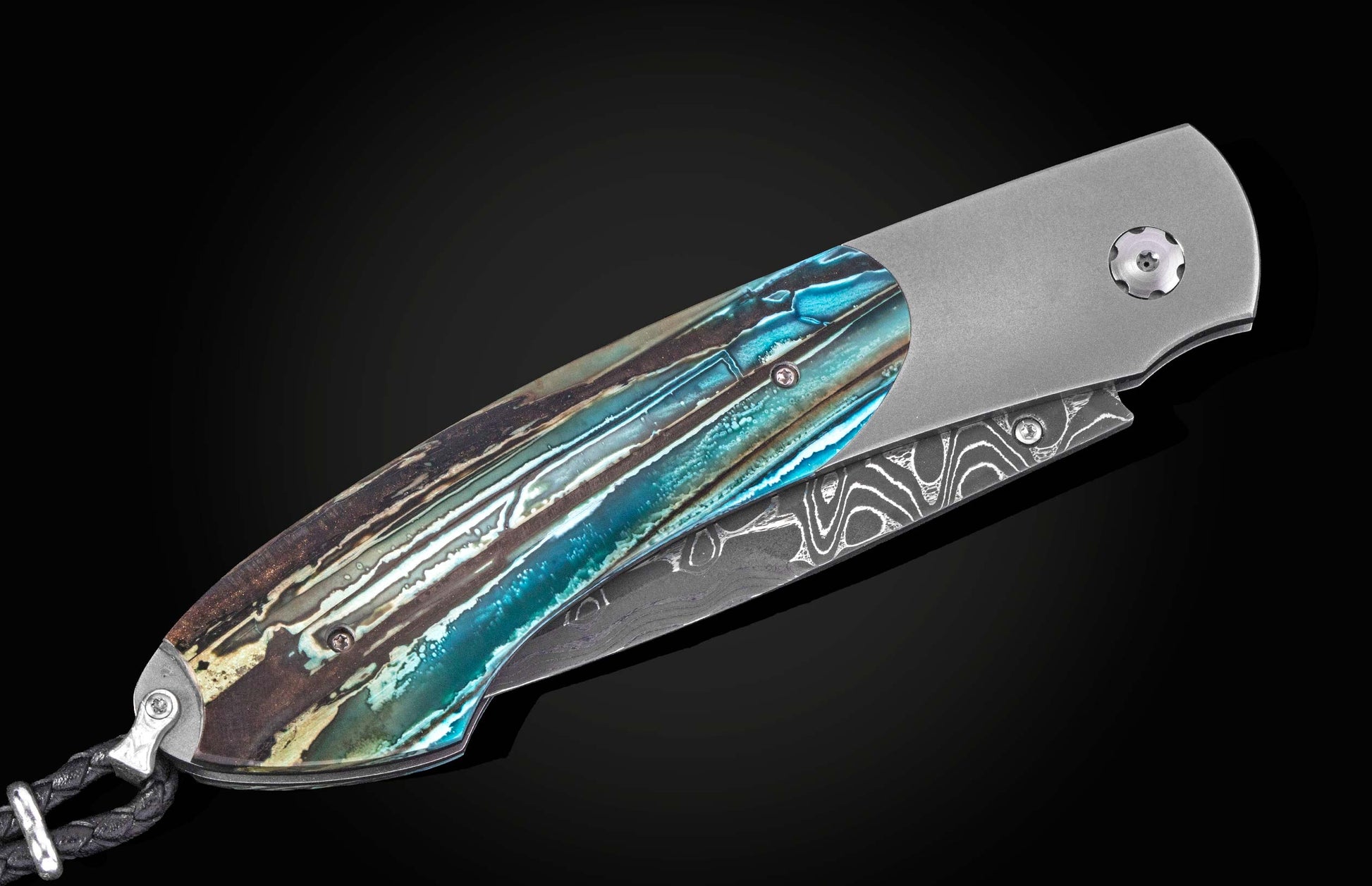 Folding knife with turquoise and brown layered handle by B12, featuring damascus steel blade and brushed titanium frame, side view on black background