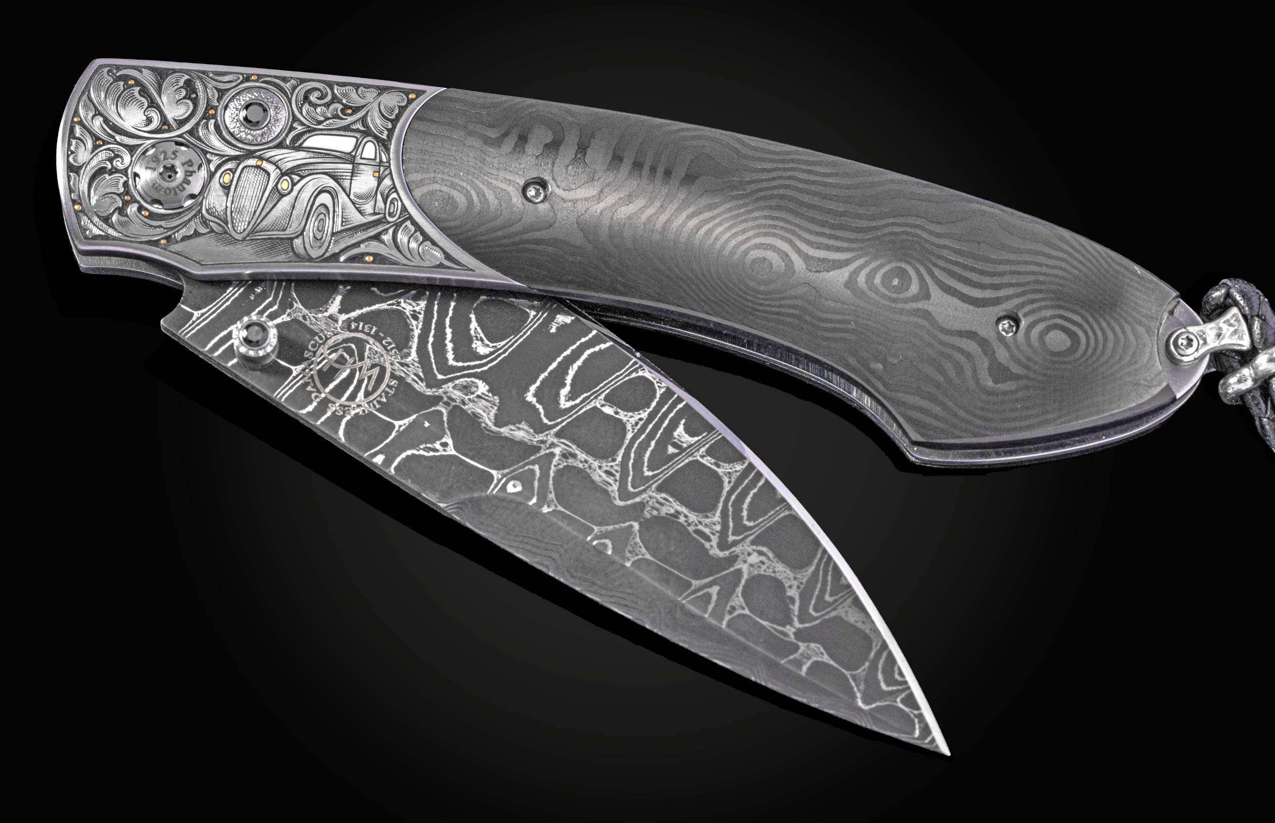 Hand engraved William Henry knife with carbon fiber and damascus steel