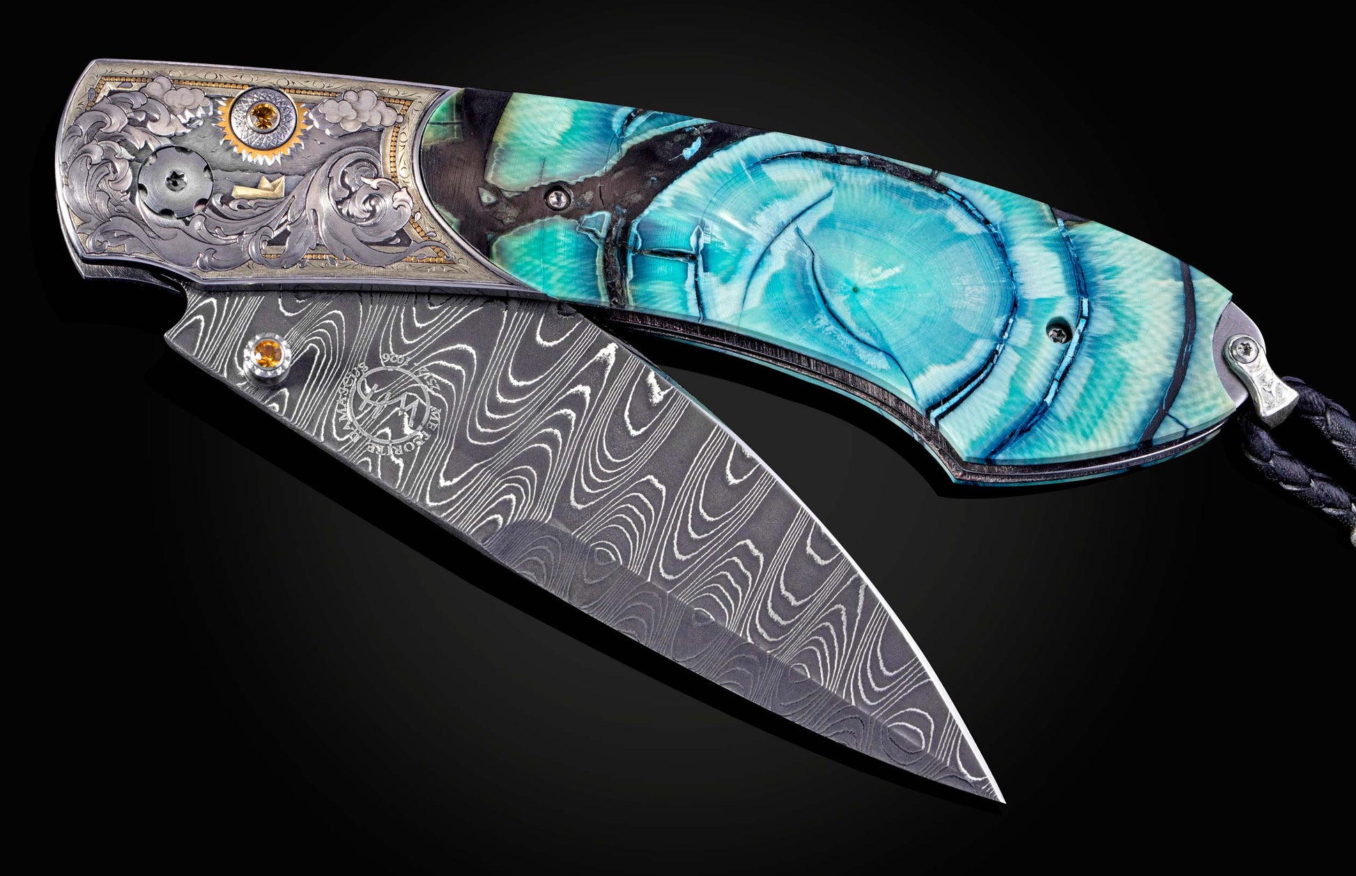 Folding knife with decorative handle and blade on a dark background