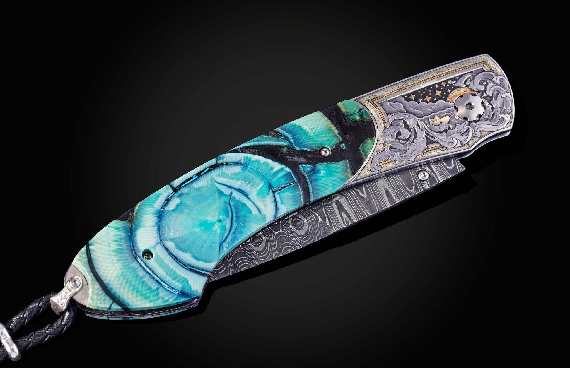 Folding knife with decorative handle on a black background