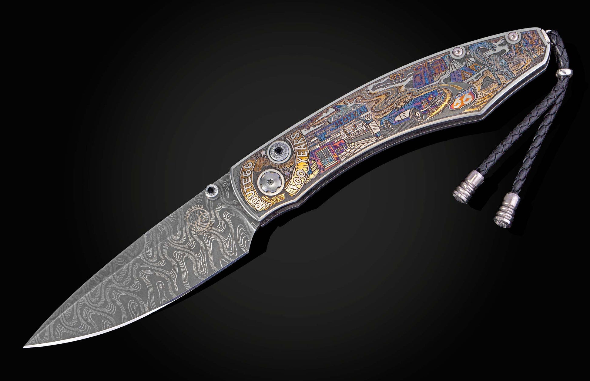 Color laser engraved knife depicting scenes from Route 66 shown open