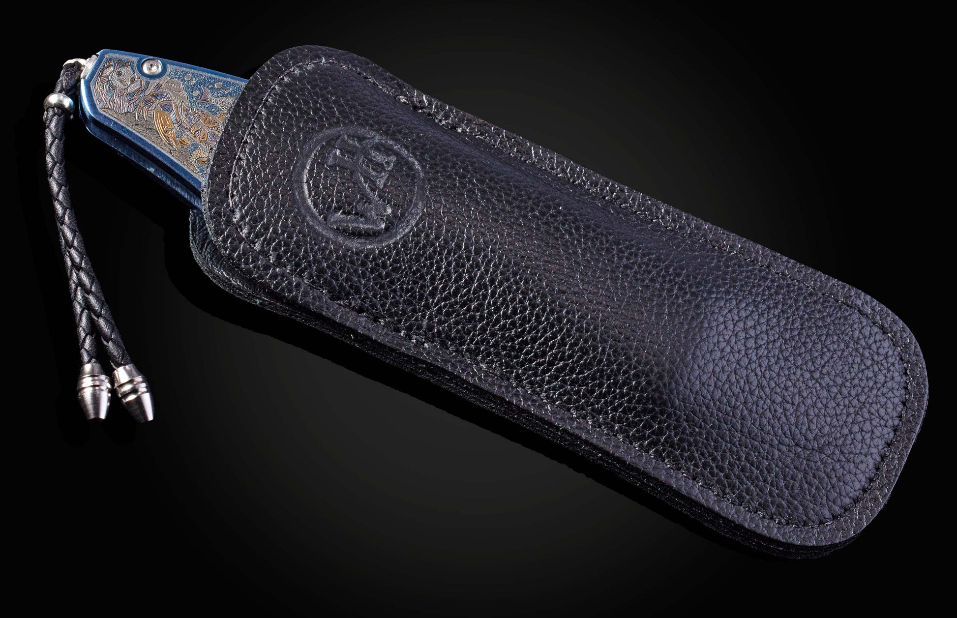 Color laser engraved William Henry Knife with damascus steel blade showing sea life