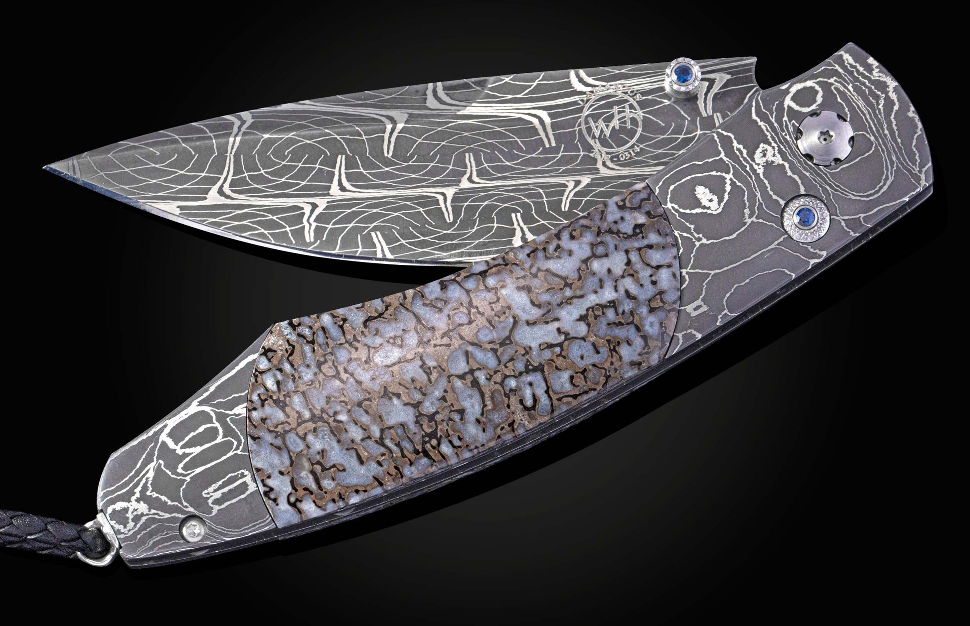 Decorative knife with damascus blade and dinosaur bone handle on a black background shown partially open