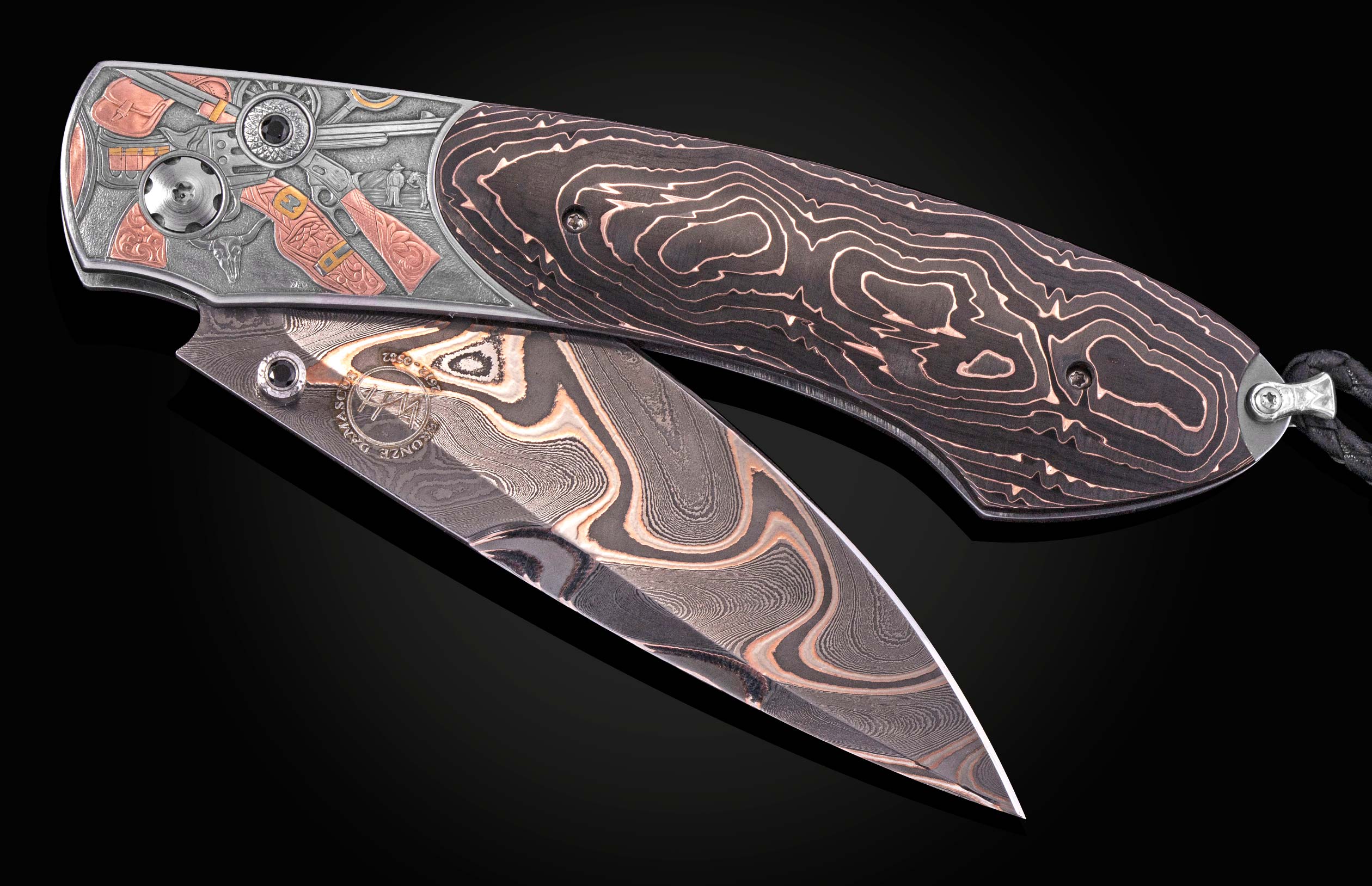 Damascus steel folding knife with intricate Western-themed engraving and patterned handle, side view on black background