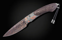 Damascus steel Western-style knife with intricate wave pattern, copper accents, and braided lanyard, side view on black background