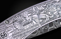 Silver-toned engraved metal knife blade featuring a Route 66 theme with 'Monica', '66', and an amusement pier.