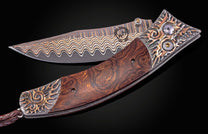 William Henry knife with hand-carved sterling silver, mokume gane, desert ironwood, and damascus steel blade