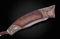 William Henry knife with hand-carved sterling silver, mokume gane, desert ironwood, and damascus steel blade