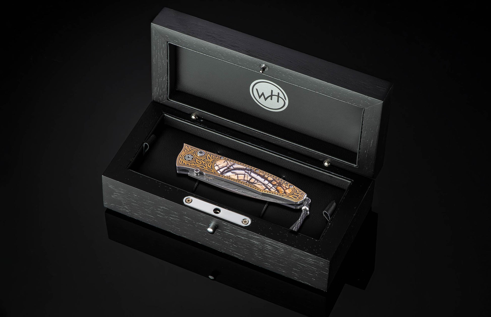 William Henry folding knife with gold koftgari designs, fossil wooly mammoth tusk, and damascus steel blade