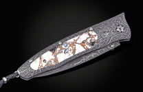 William Henry folding knife with damascus steel and white turquoise in bornze.
